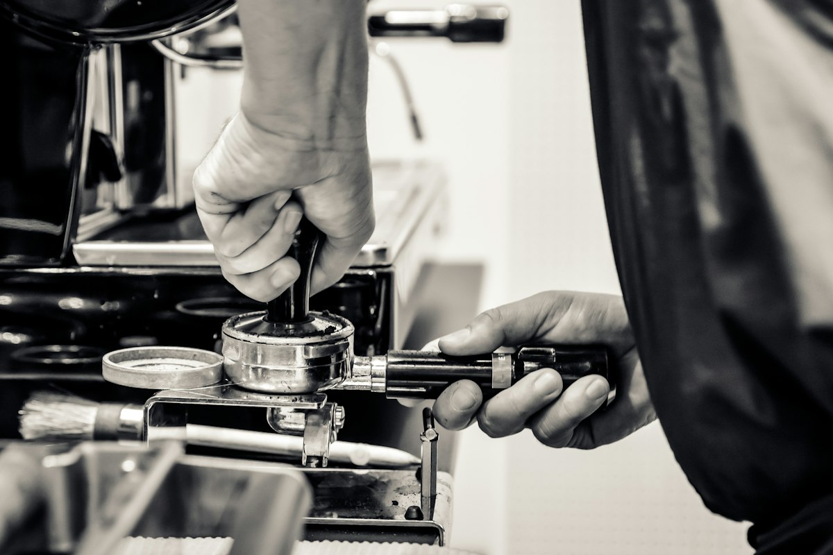 Premium coffee tamper in action